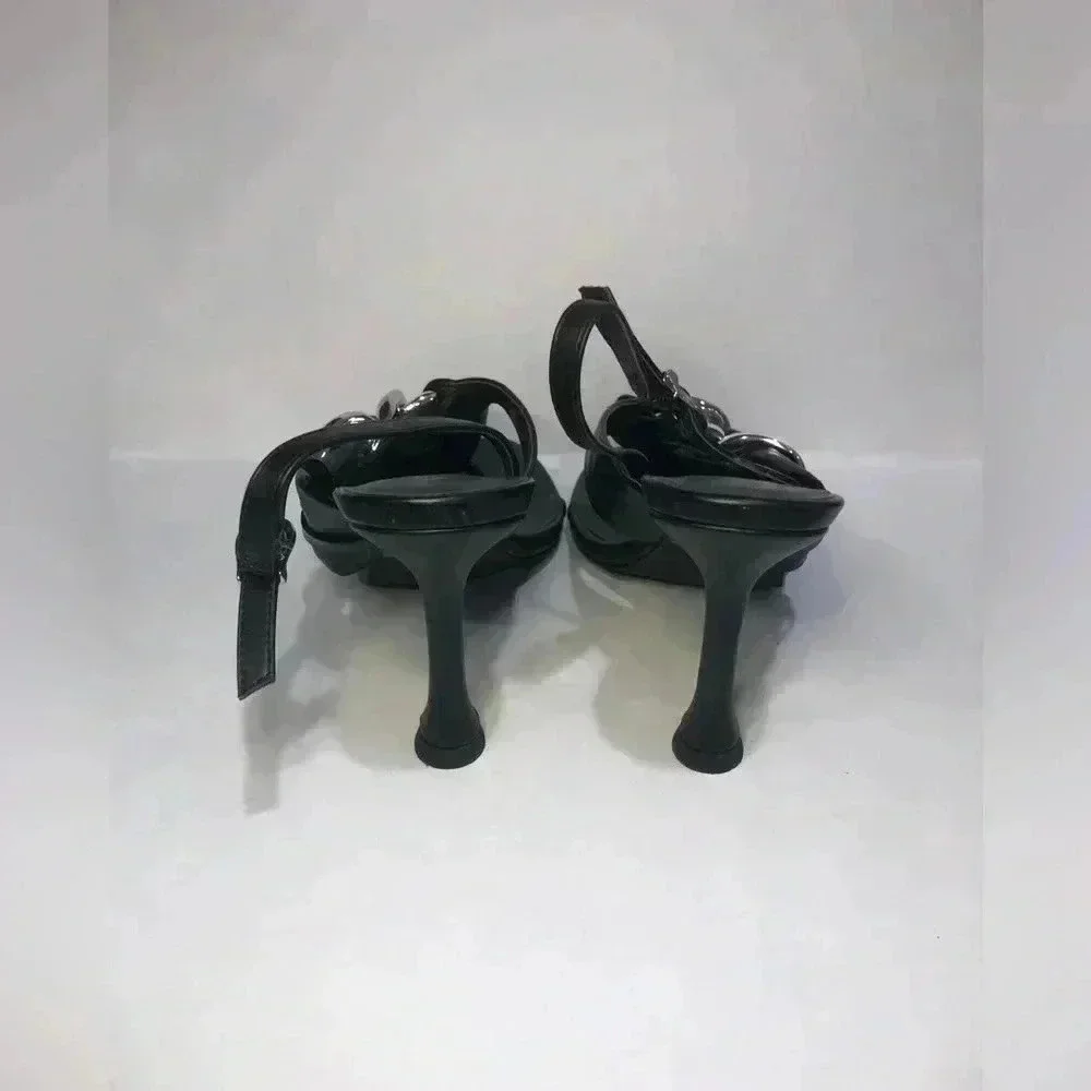 Black and silver heels size 7.5